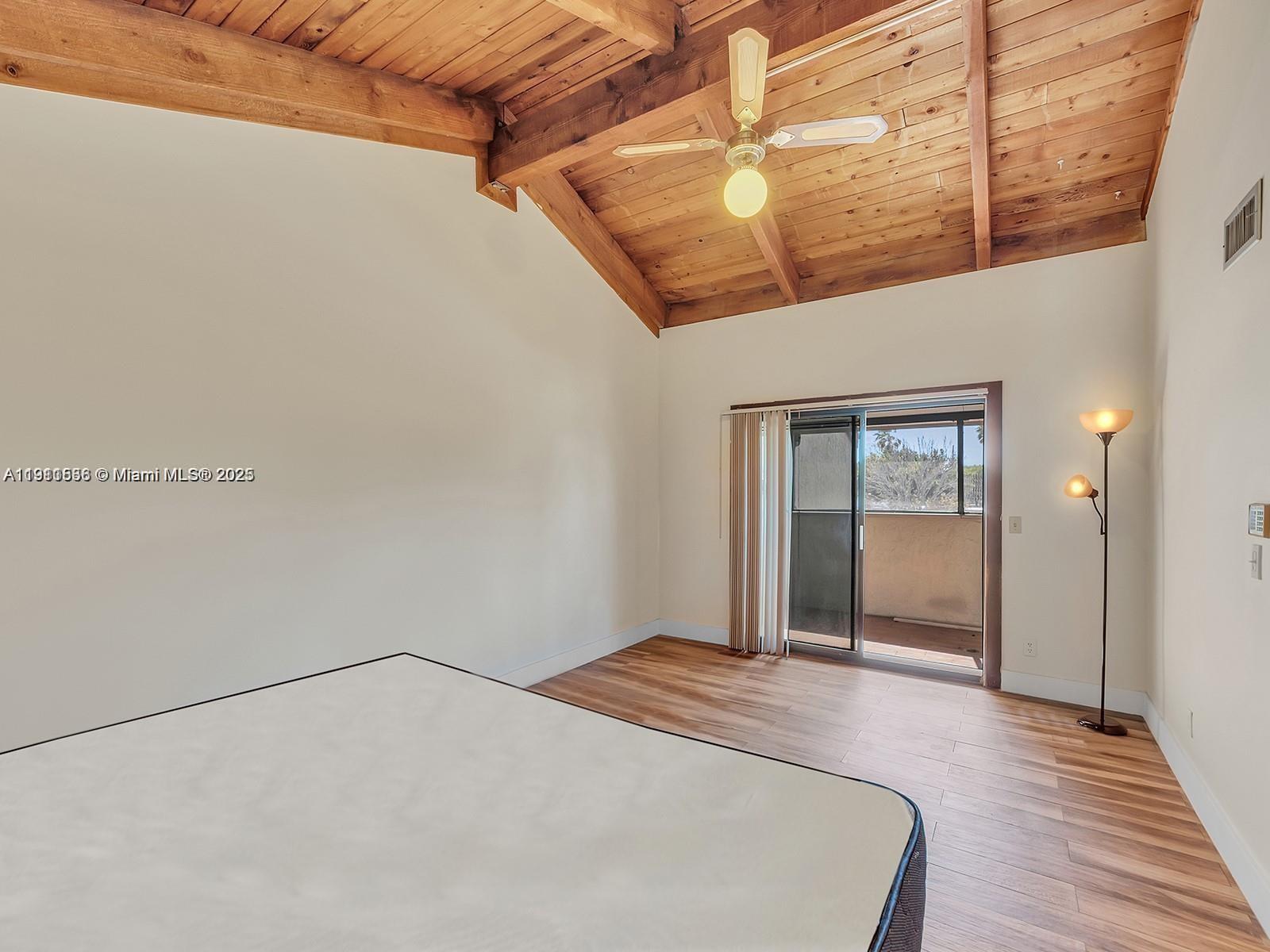 2701 Southwest 58th Manor, Unit B Dania Beach, FL 33312 - Photo 5 of 18 a bedroom with a bed and a dresser