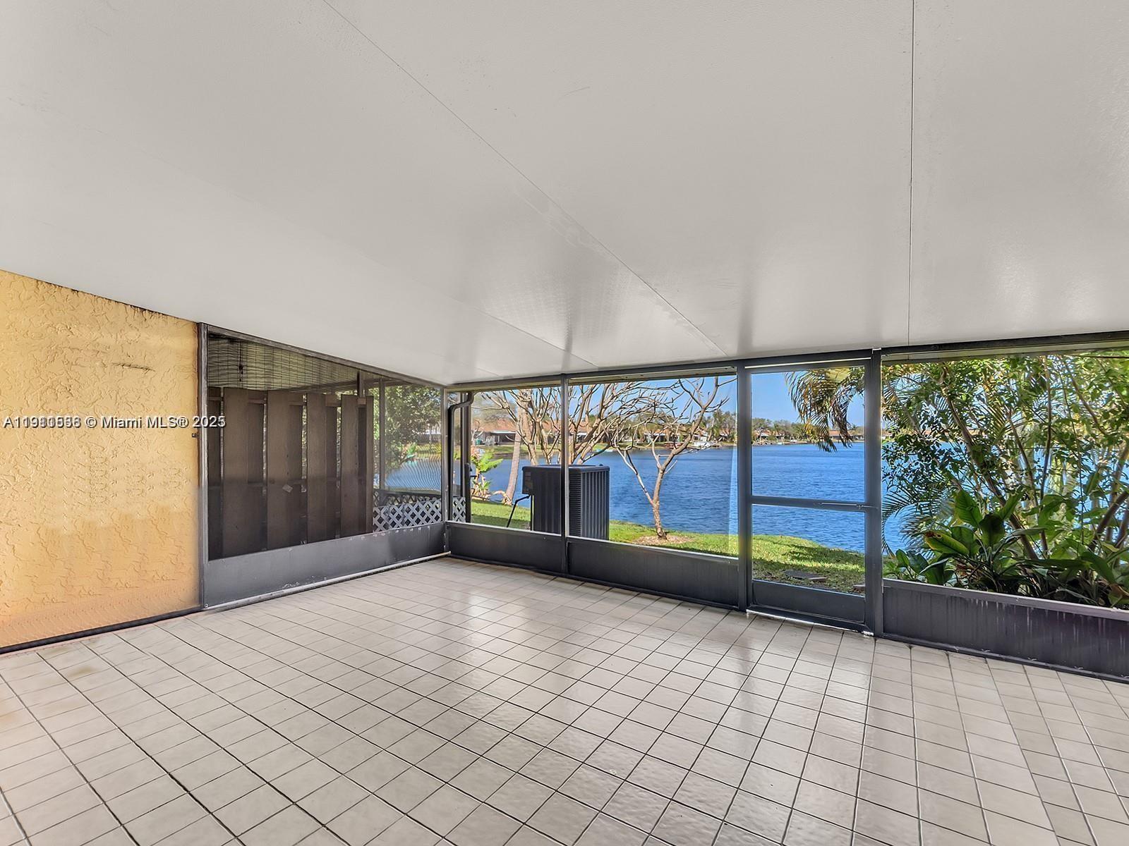 2701 Southwest 58th Manor, Unit B Dania Beach, FL 33312 - Photo 6 of 18 a view of entryway with a window