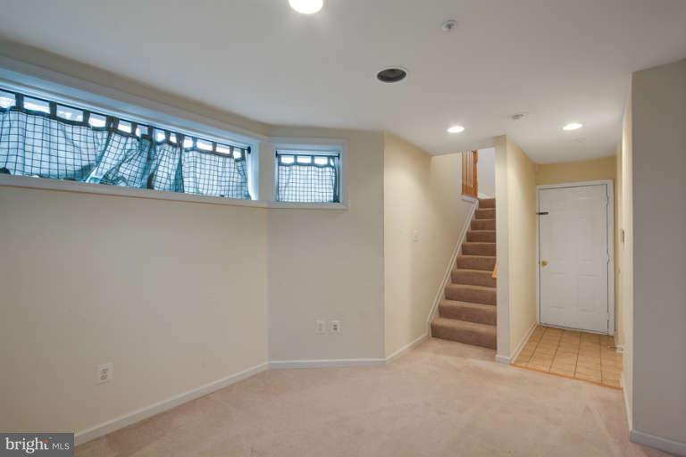 10220 Rutland Round Road, Unit 30 Columbia, MD 21044 - Photo 23 of 30 Family Room leading to main level