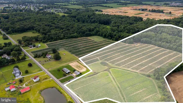 an aerial view of a house with a garden