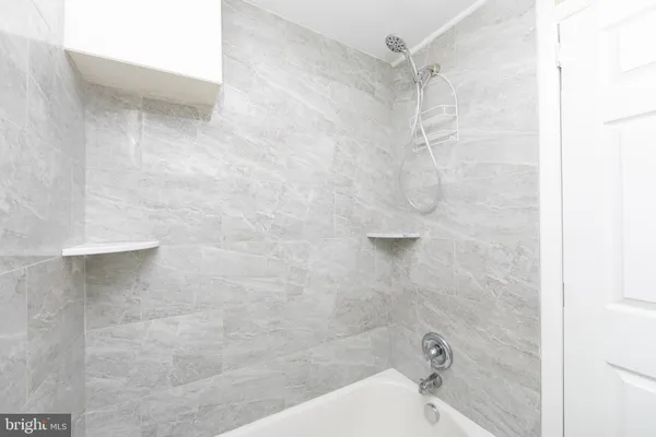a bathroom with a bathtub