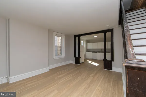 a view of an empty room and window