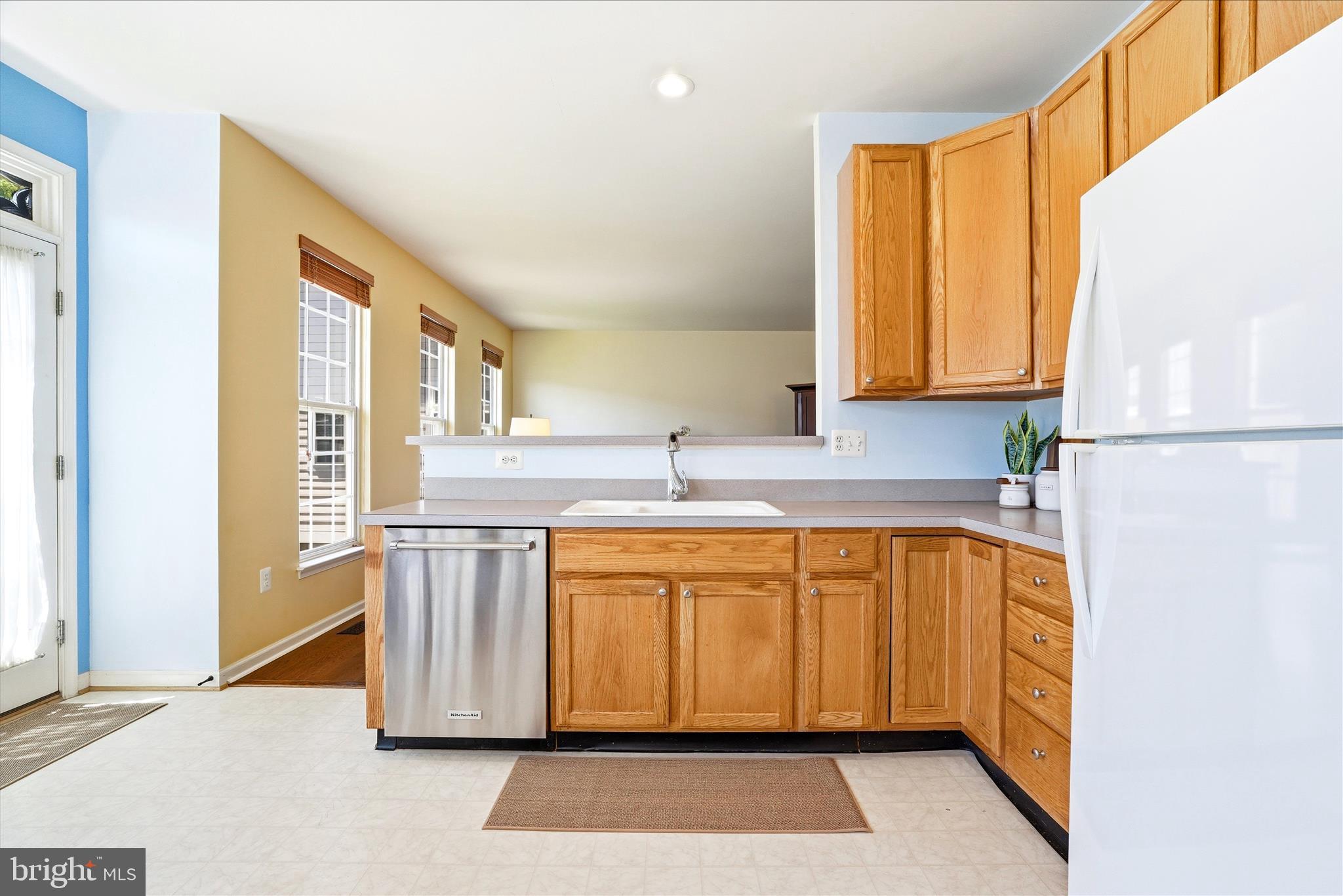9009 Bealls Farm Road Frederick, MD 21704 - Photo 8 of 41 a kitchen with stainless steel appliances granite countertop a sink and a refrigerator