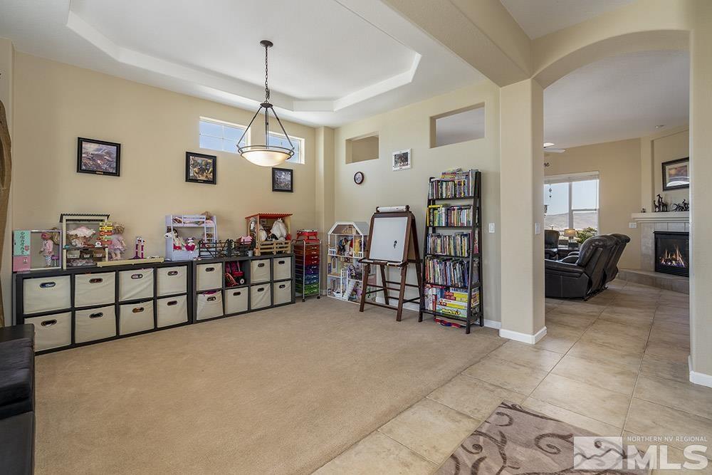 6840 Marble Canyon Road Reno, NV 89511 - Photo 2 of 39 a bedroom with furniture