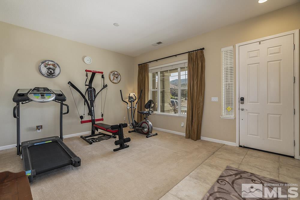 6840 Marble Canyon Road Reno, NV 89511 - Photo 4 of 39 a view of a room with gym equipment