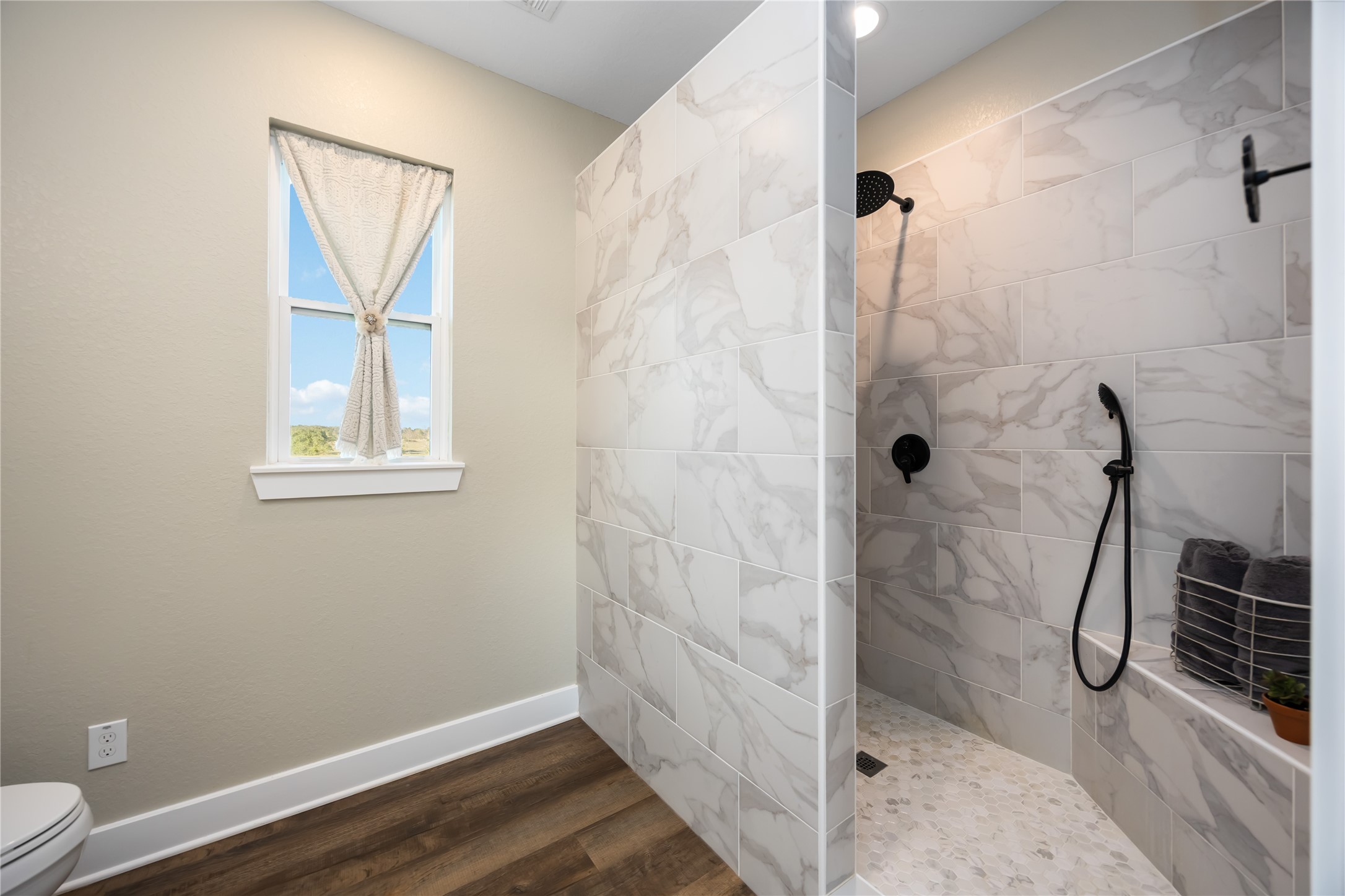 330 Ridge Road Manvel, TX 77578 - Photo 17 of 37 The bathroom offers an oversized shower with a bench seat.