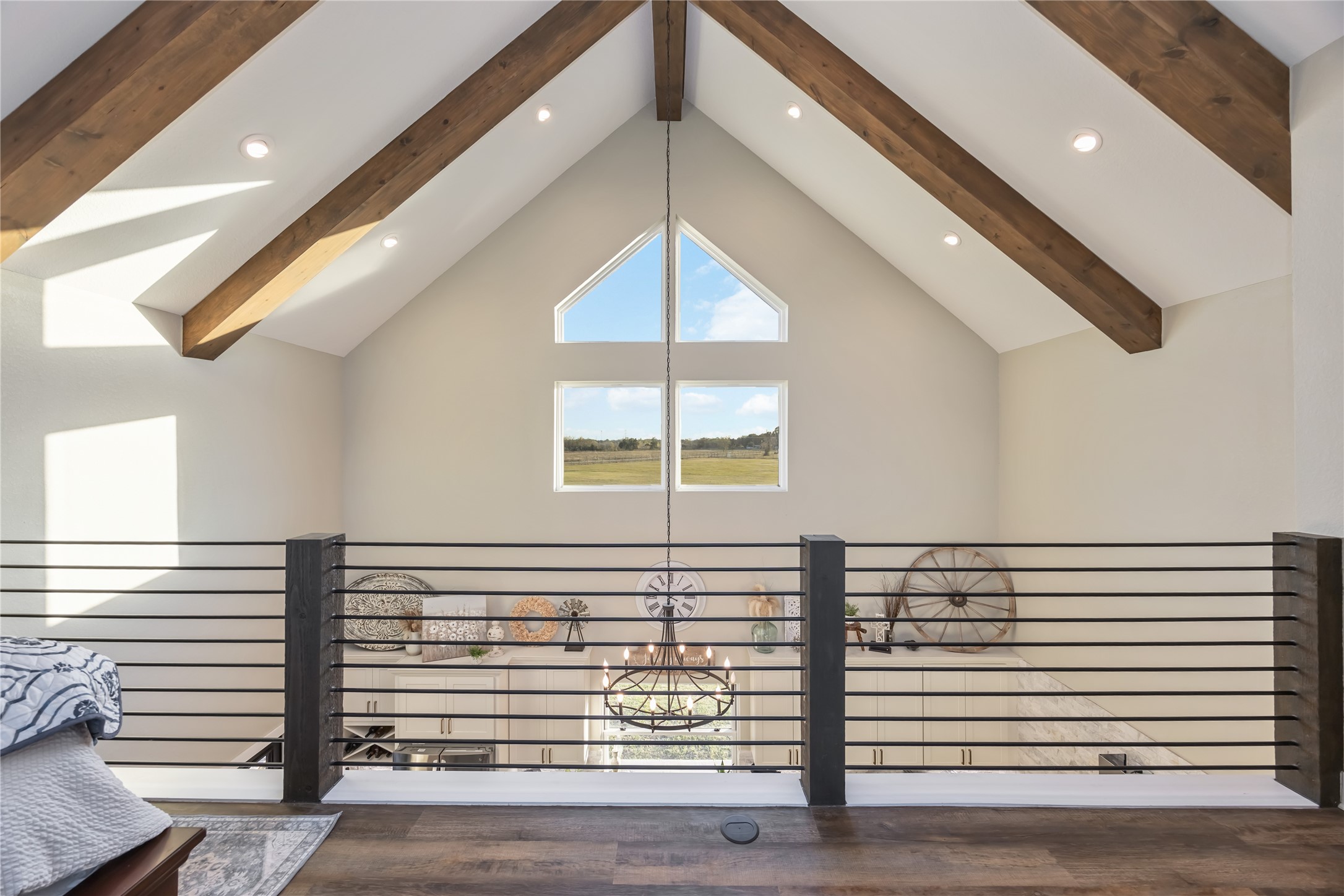 330 Ridge Road Manvel, TX 77578 - Photo 26 of 37 The balcony from the bedroom overlooks the downstairs.