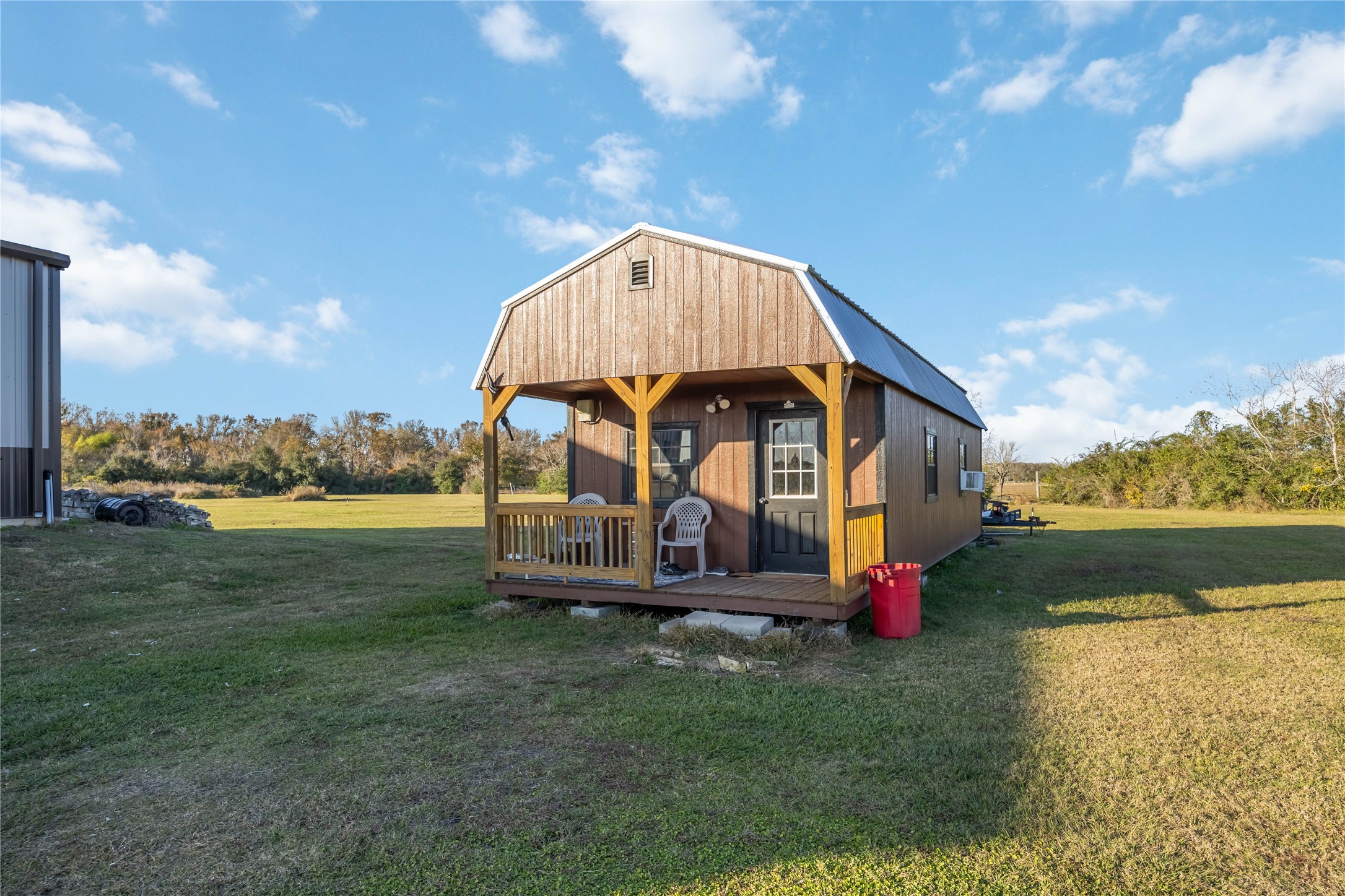330 Ridge Road Manvel, TX 77578 - Photo 28 of 37 There is also a tiny house on the property. This is a second living space or a large storage.