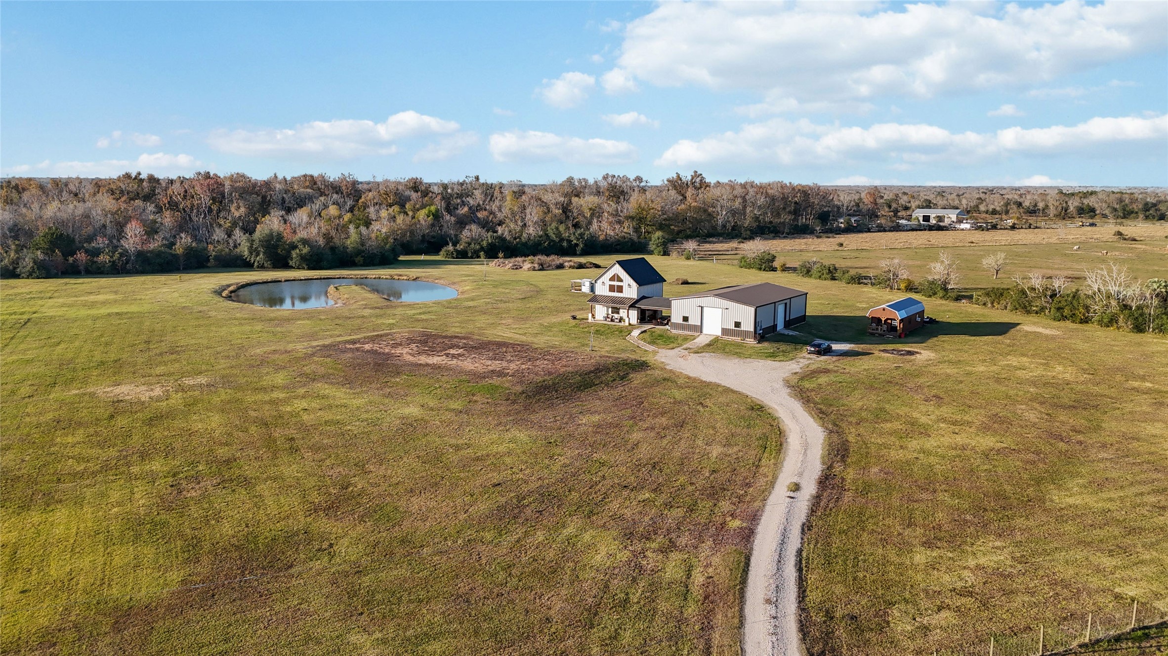 330 Ridge Road Manvel, TX 77578 - Photo 35 of 37 The brown area to the left is where the big house pad is located.
