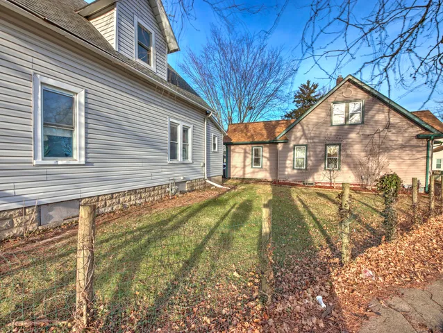 a view of swimming pool with a backyard