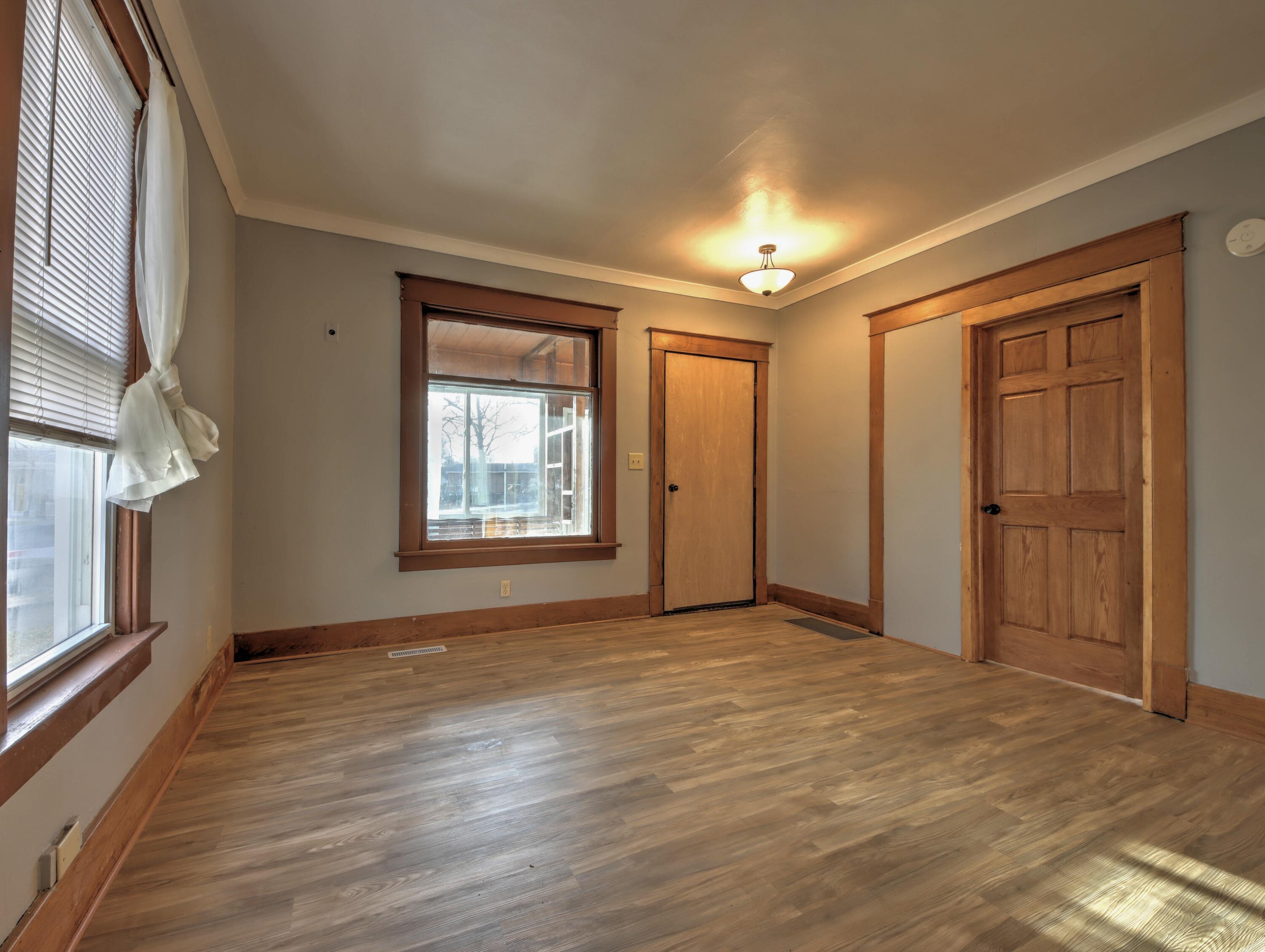 119 Patton Street La Porte, IN 46350 - Photo 4 of 26 a view of an empty room with a window