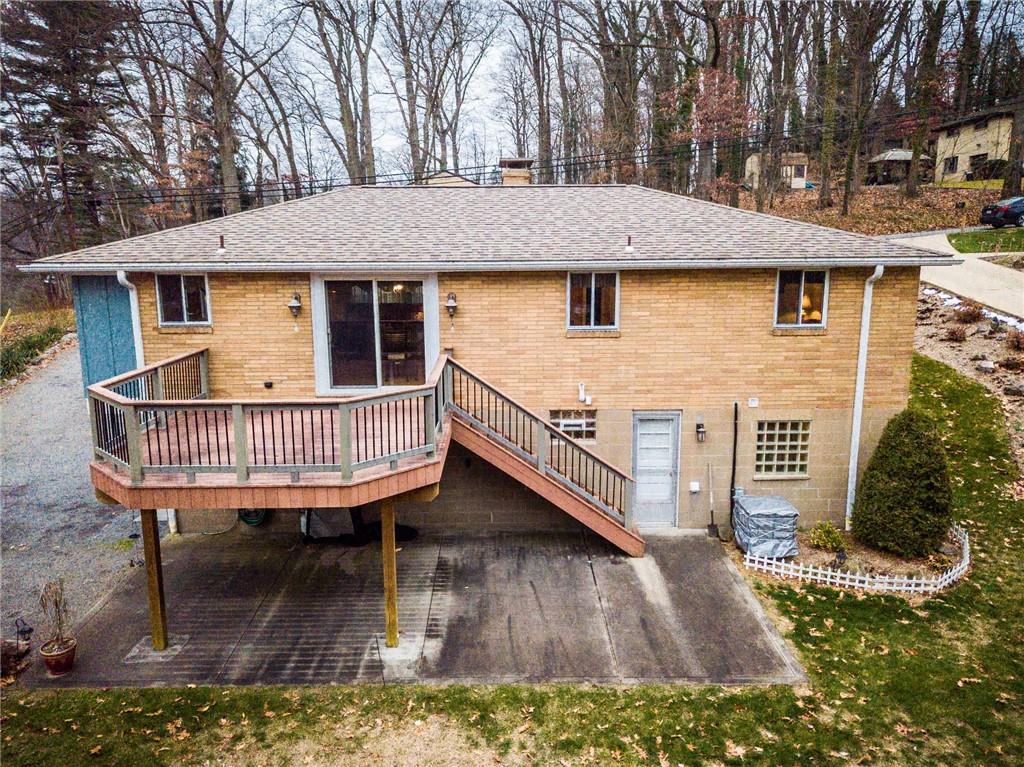 9415 Pannier Road Pittsburgh, PA 15237 - Photo 21 of 25 Rear view of the house with large deck
