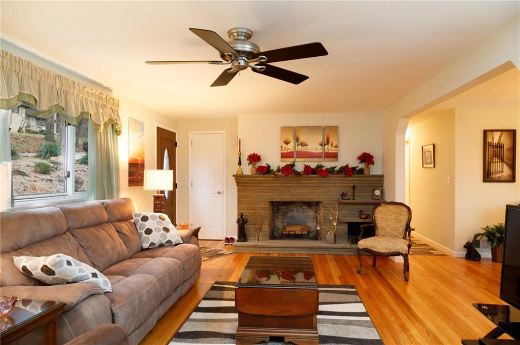9415 Pannier Road Pittsburgh, PA 15237 - Photo 4 of 25 Stone fireplace & big picture windows