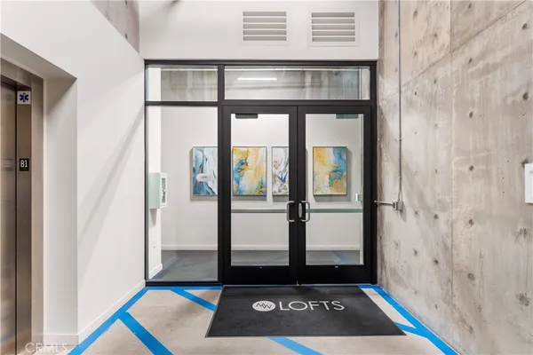 a view of front door with a glass door