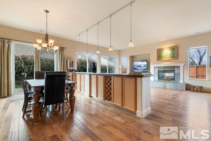 1630 Brightstone Court Reno, NV 89521 - Photo 3 of 27 a view of a dining room with furniture window and wooden floor