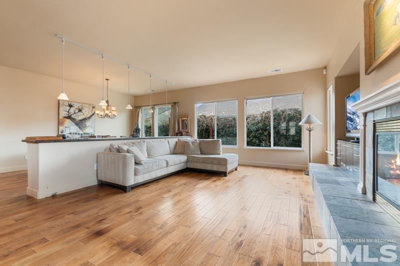 1630 Brightstone Court Reno, NV 89521 - Photo 10 of 27 a living room with furniture window and wooden floor