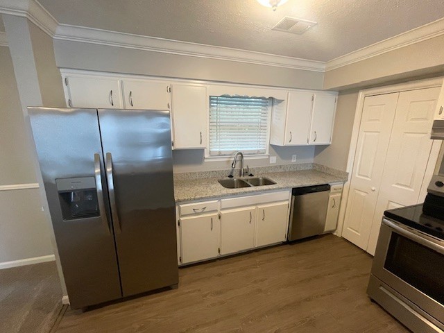 905 Lenora Court Nashville, TN 37217 - Photo 7 of 21 a kitchen with a refrigerator sink and microwave