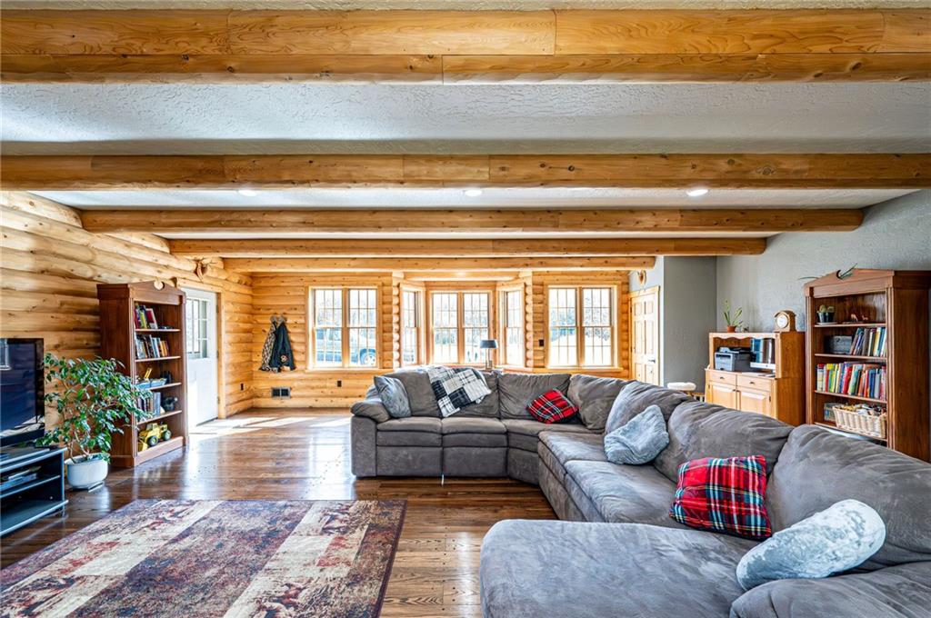 120 Youngstown Ridge Road Ligonier, PA 15658 - Photo 21 of 50 a living room with furniture and a potted plant