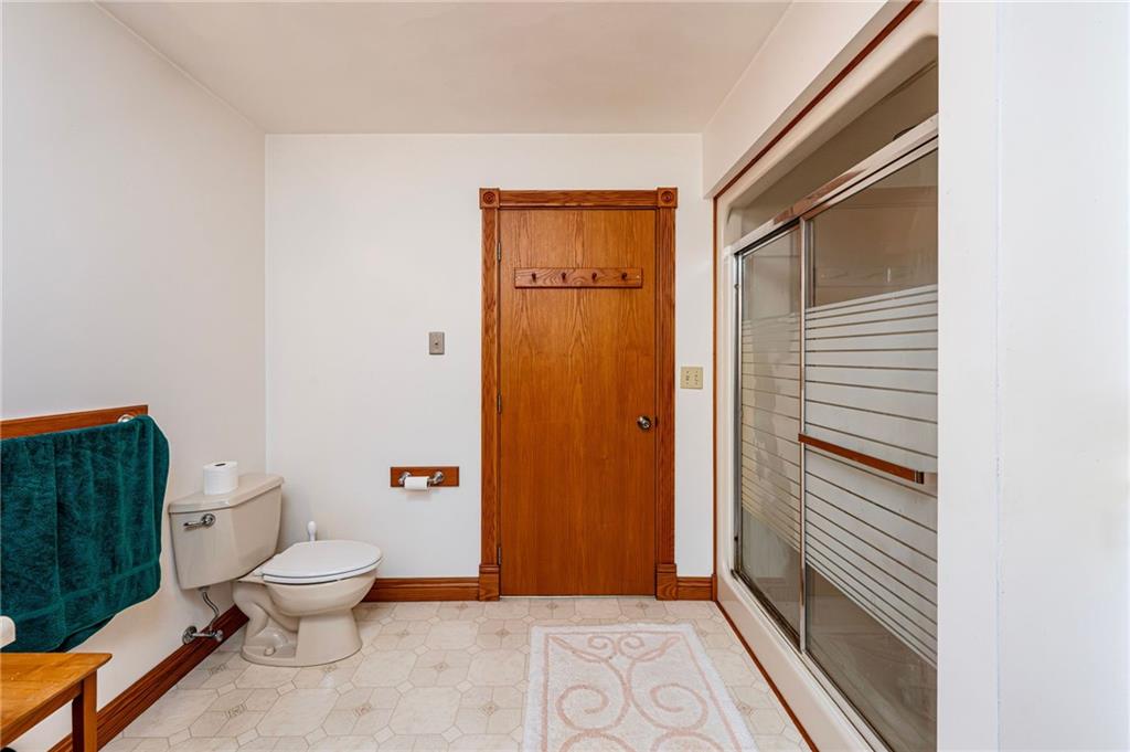 120 Youngstown Ridge Road Ligonier, PA 15658 - Photo 33 of 50 a bathroom with a toilet and a shower