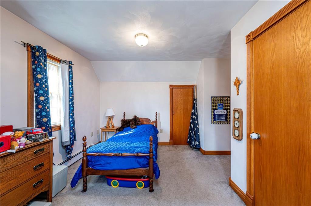 120 Youngstown Ridge Road Ligonier, PA 15658 - Photo 34 of 50 a living room with furniture and a yard