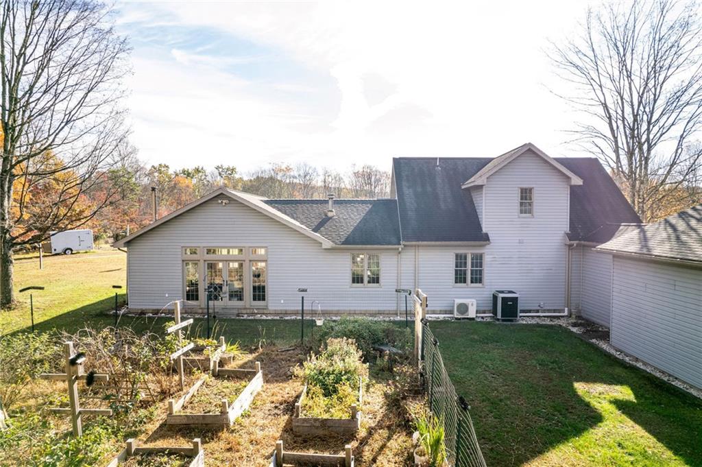 120 Youngstown Ridge Road Ligonier, PA 15658 - Photo 5 of 50 a front view of a house with a yard