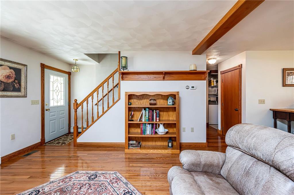 120 Youngstown Ridge Road Ligonier, PA 15658 - Photo 10 of 50 a living room with furniture and wooden floor