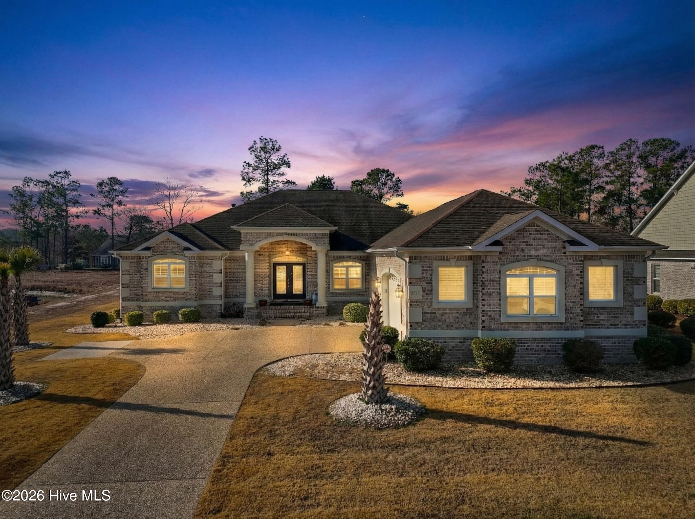 1157 Sabel Loop Southeast Bolivia, NC 28422 - Photo 4 of 75 EXT EVENING