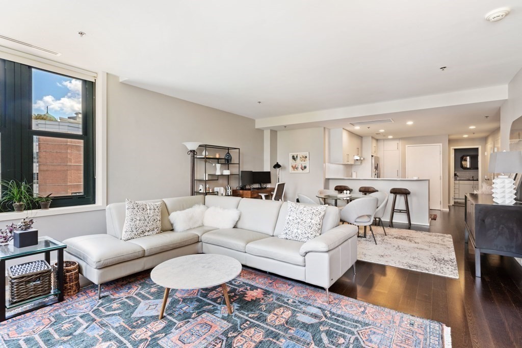 9 West Broadway, Unit 500 Boston, MA 02127 - Photo 5 of 21 a living room with furniture and a large window