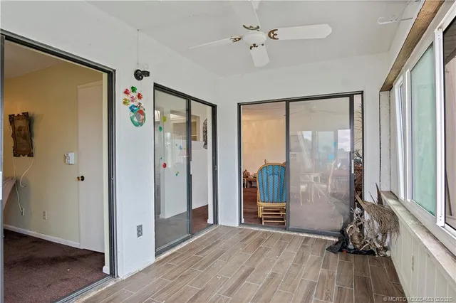a bedroom with double bed and a window