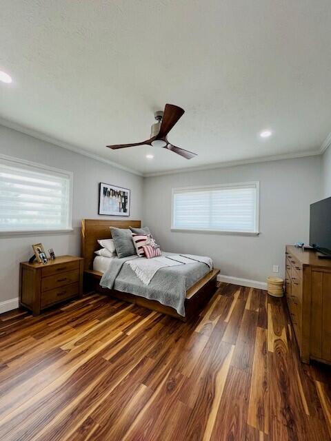 358 Stirrup Key Boulevard Marathon, FL 33050 - Photo 24 of 29 a bedroom with a bed and wooden floor