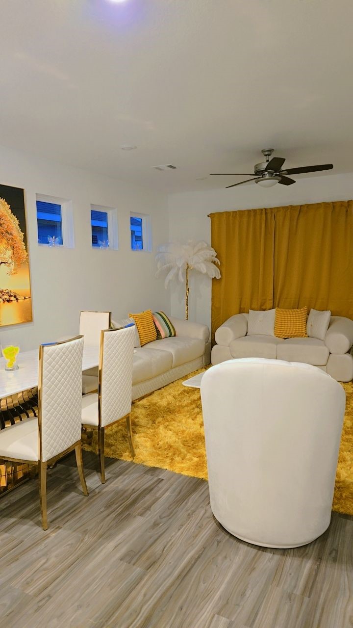 7122 Clearwater Cv Drive Cypress, TX 77433 - Photo 4 of 10 a spacious bedroom with a bed and a table in it