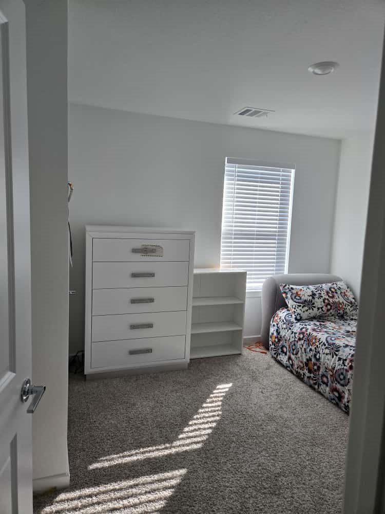 7122 Clearwater Cv Drive Cypress, TX 77433 - Photo 7 of 10 a bedroom with a bed and a window