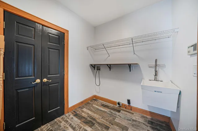 a bedroom with a bed and cabinets