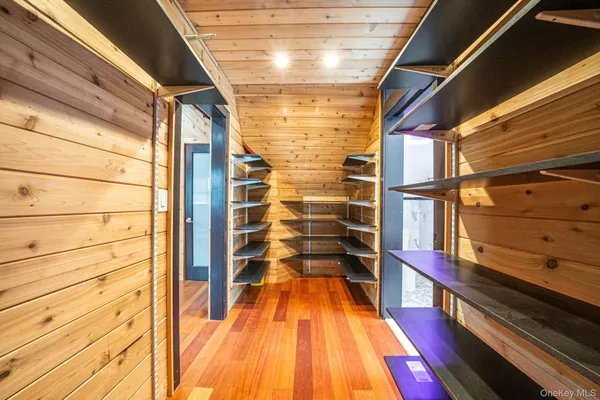 a view of outdoor space with wooden floor and city view