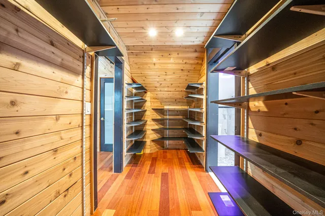 a view of outdoor space with wooden floor and city view