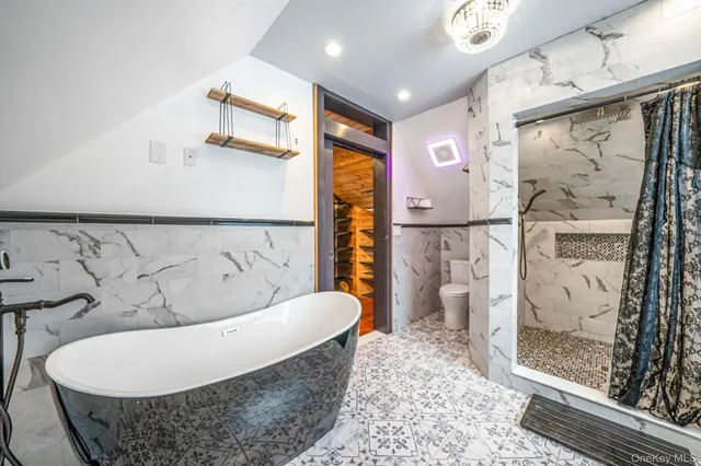 a living room with a couch and a rug