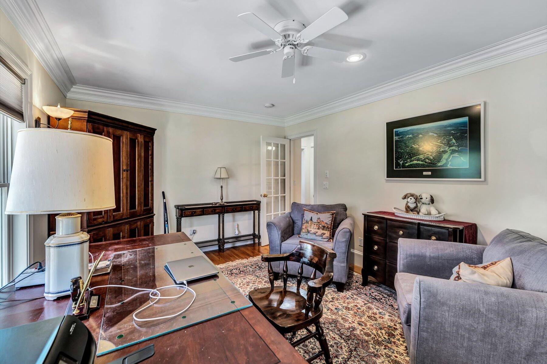 11 Reflection Drive Sandwich, MA 02563 - Photo 11 of 44 a living room with furniture and a flat screen tv