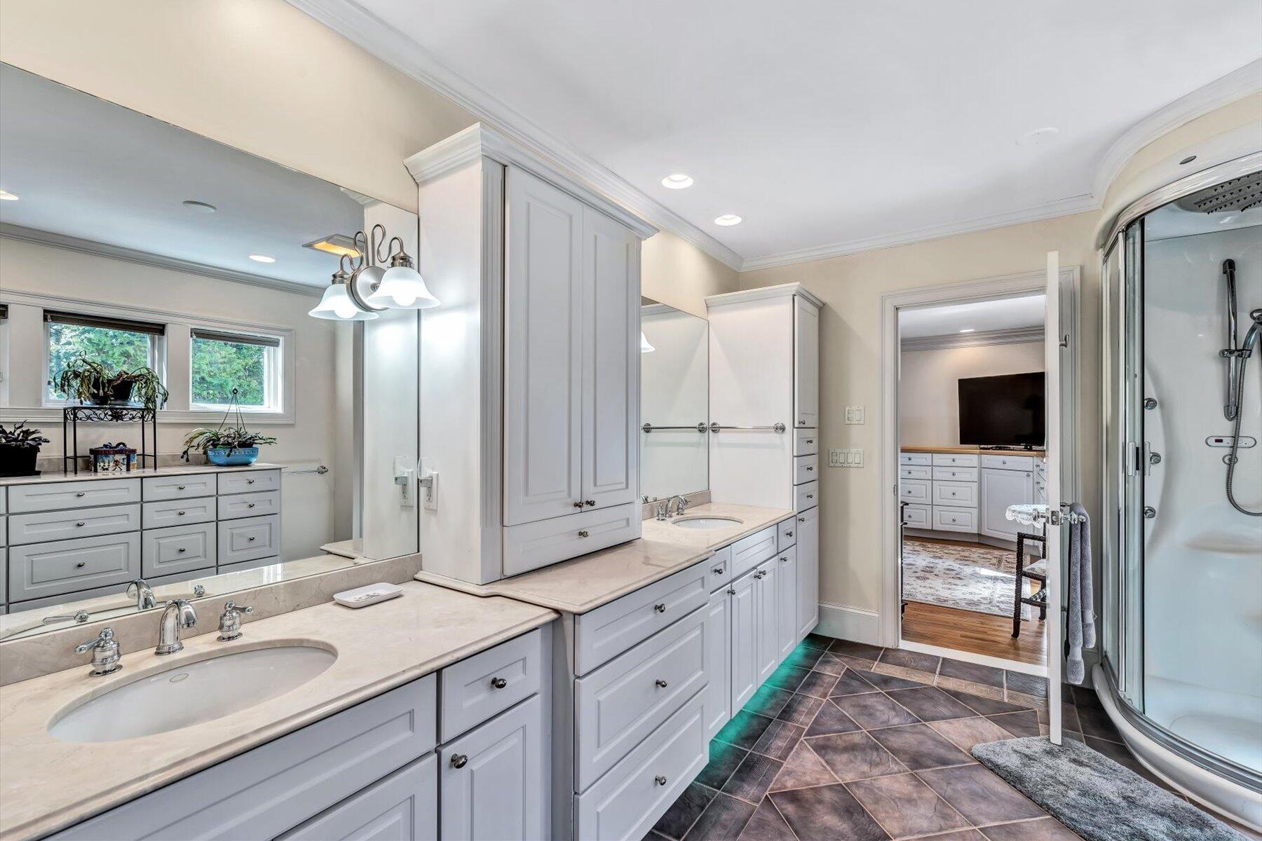11 Reflection Drive Sandwich, MA 02563 - Photo 16 of 44 a spacious bathroom with a double vanity sink mirror and double