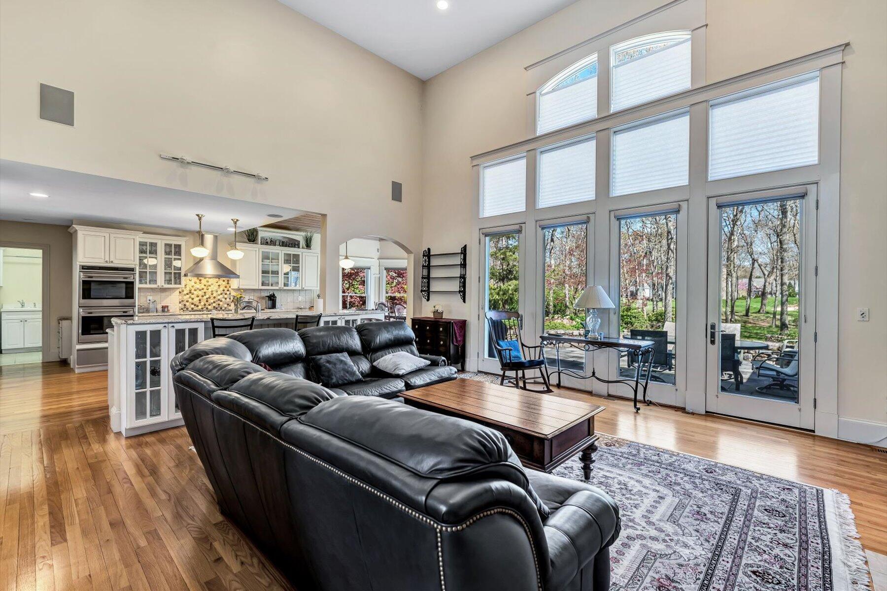 11 Reflection Drive Sandwich, MA 02563 - Photo 19 of 44 a living room with furniture and a large window