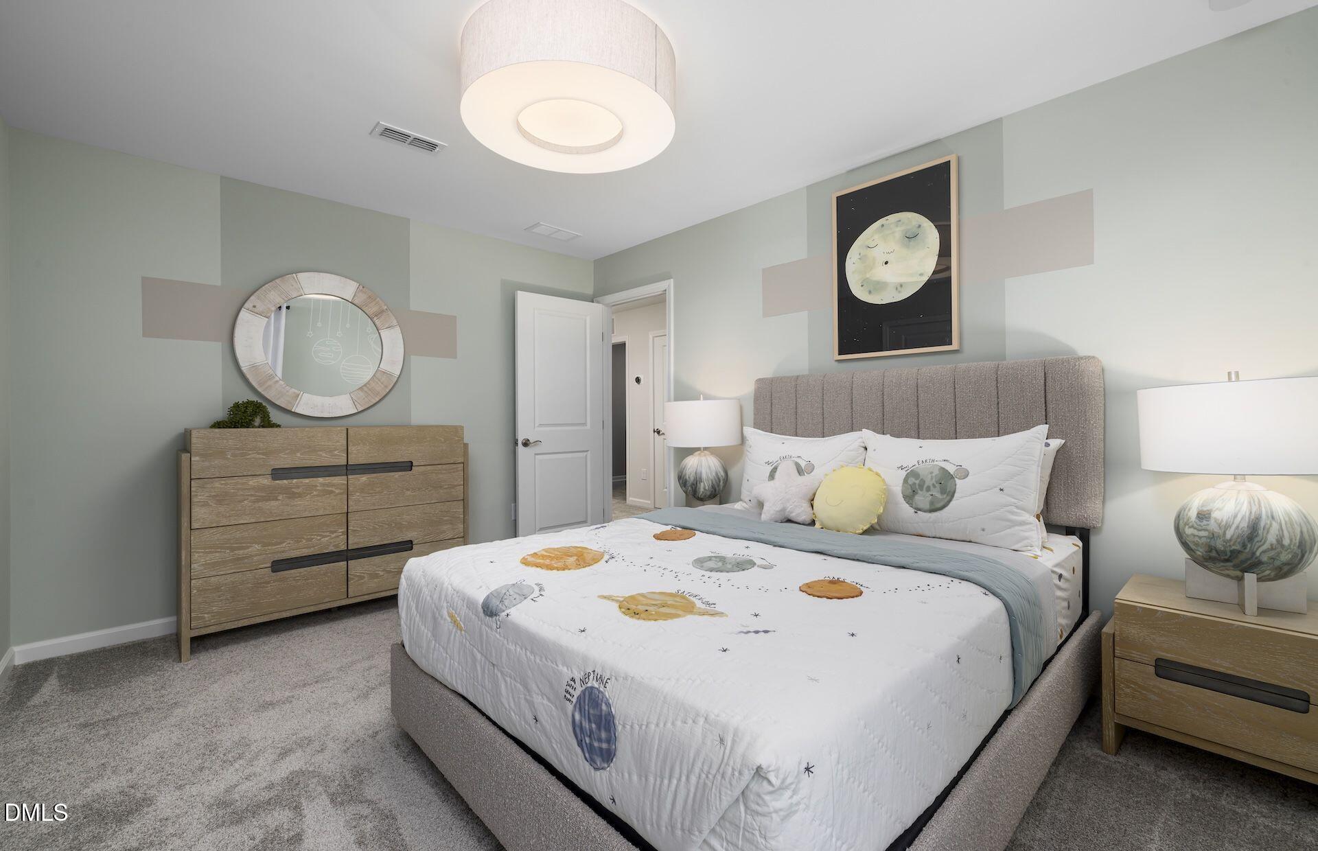 613 Ben Ledi Court Raleigh, NC 27603 - Photo 21 of 32 a bedroom with a bed and a chandelier