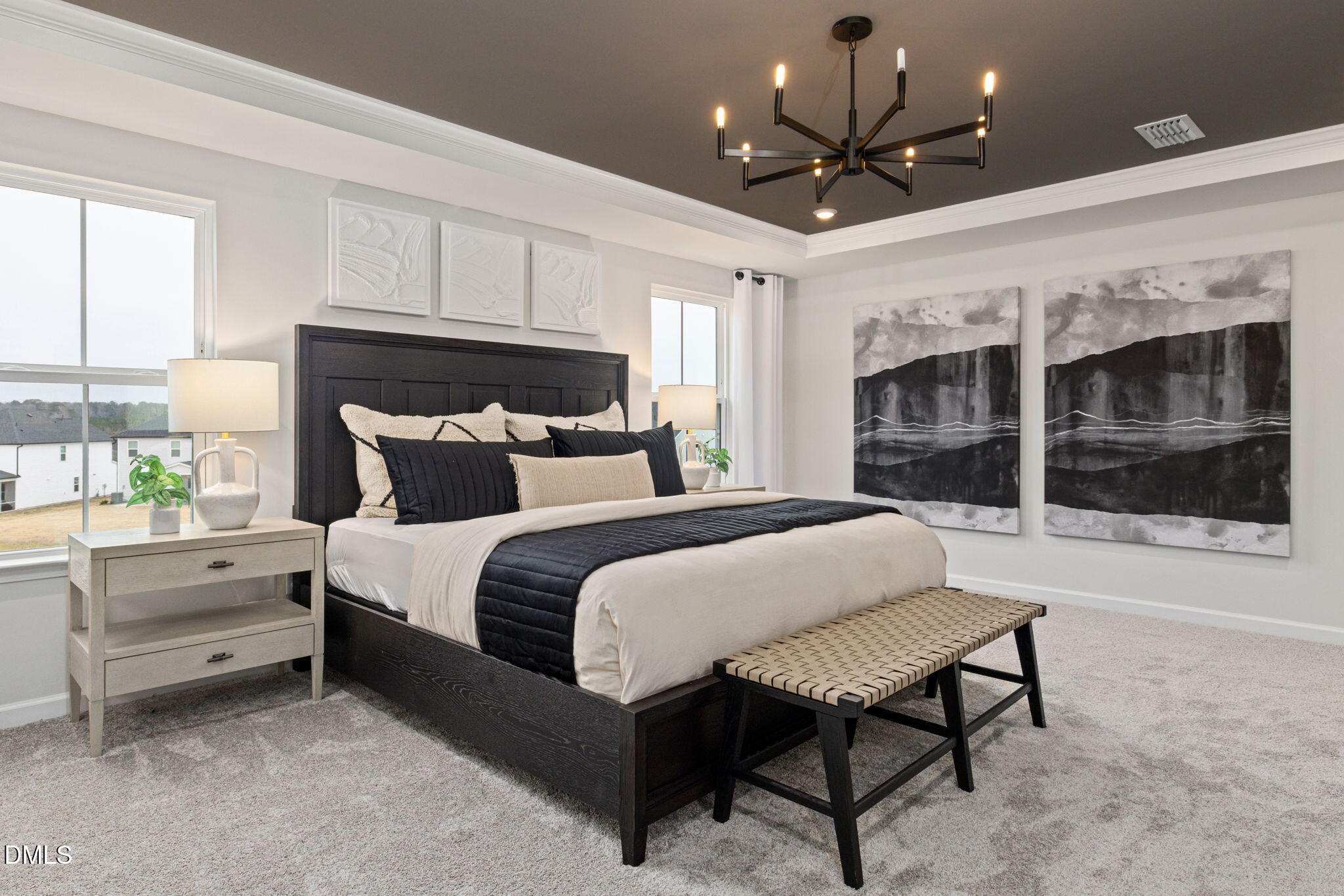 613 Ben Ledi Court Raleigh, NC 27603 - Photo 8 of 32 a bedroom with a bed mirror and a large window