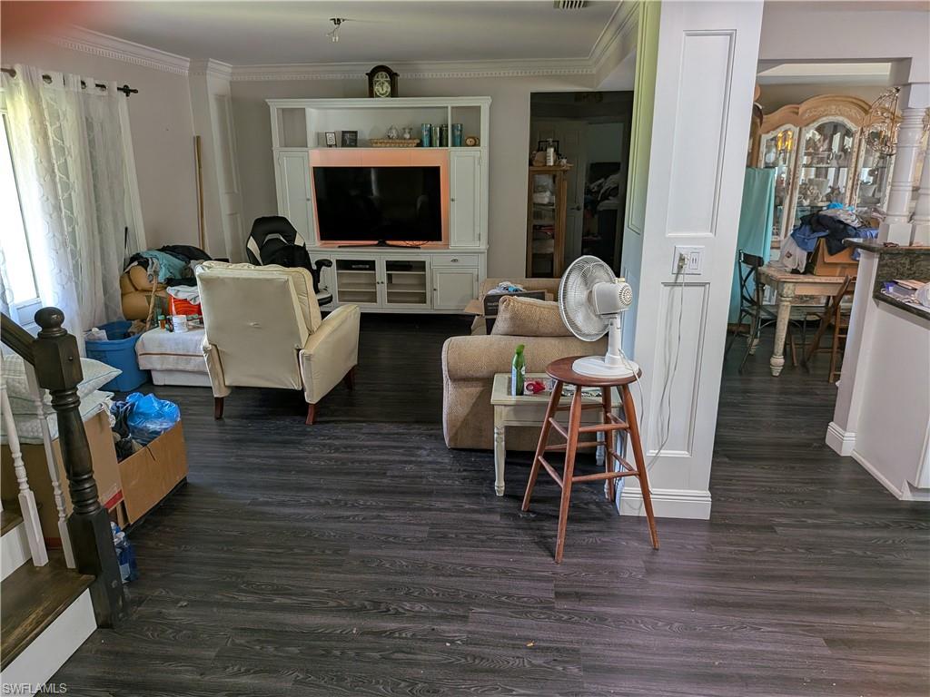17191 Frank Road Alva, FL 33920 - Photo 12 of 27 a living room with furniture and a flat screen tv