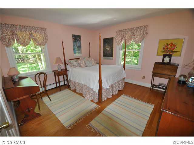 4324 Croatan Road Richmond, VA 23235 - Photo 17 of 22 a living room with furniture and a wooden floor