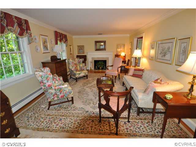 4324 Croatan Road Richmond, VA 23235 - Photo 3 of 22 a living room with furniture and a fireplace