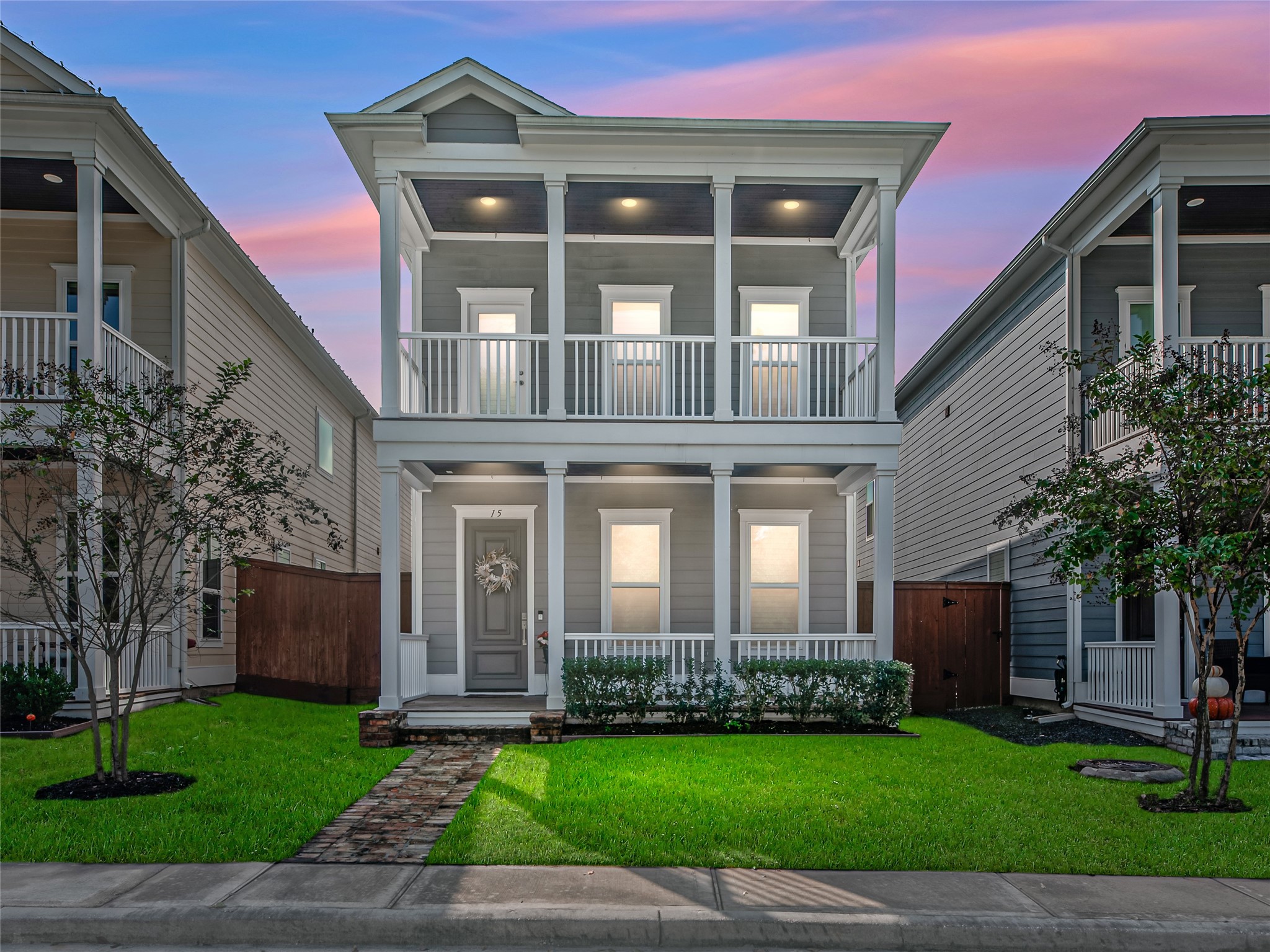 15 Black Dog Lane Spring, TX 77389 - Photo 1 of 32 a front view of a house with a yard and potted plants