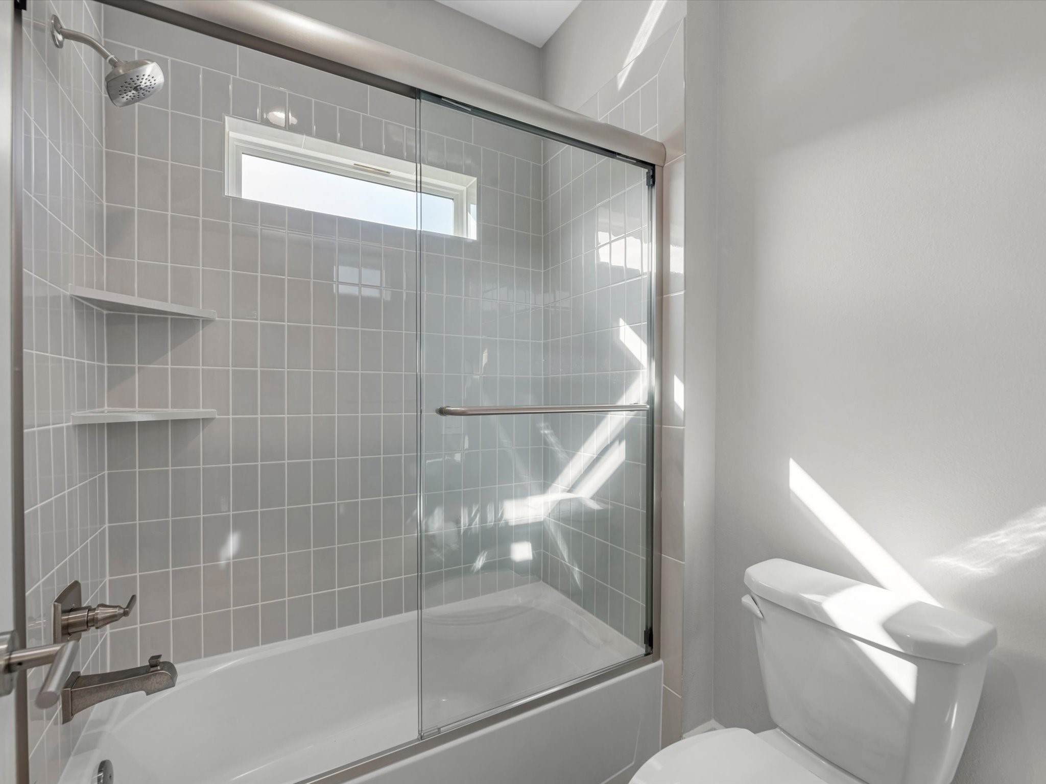 15 Black Dog Lane Spring, TX 77389 - Photo 23 of 32 a bathroom with a bathtub and a shower