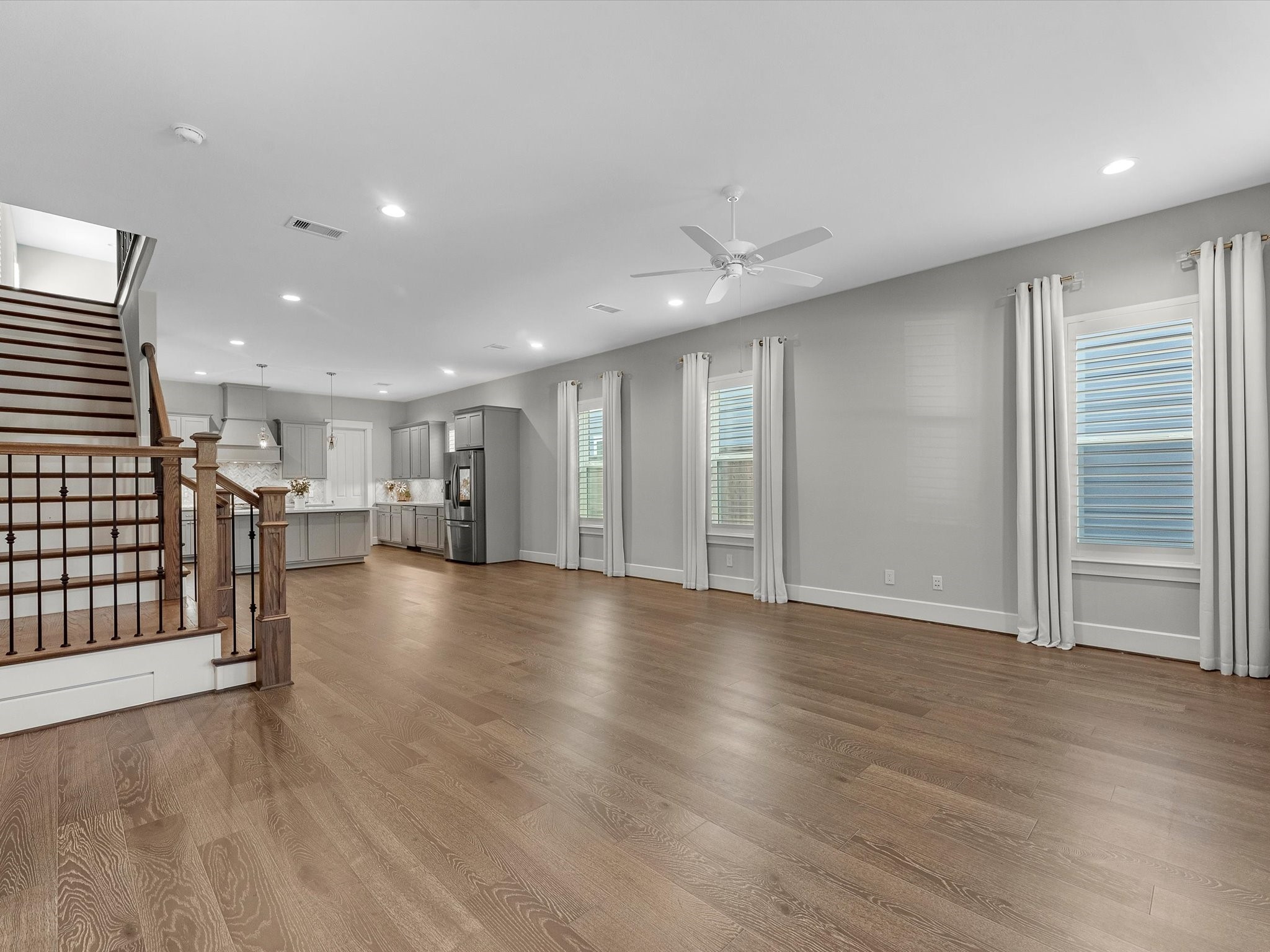 15 Black Dog Lane Spring, TX 77389 - Photo 4 of 32 an empty room with wooden floor and windows