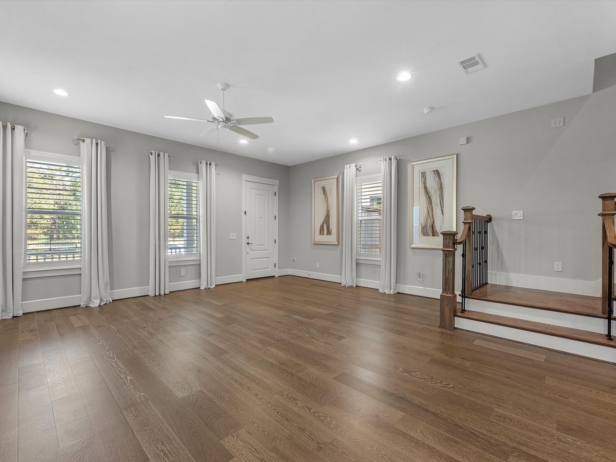 15 Black Dog Lane Spring, TX 77389 - Photo 10 of 32 a view of empty room with wooden floor and window