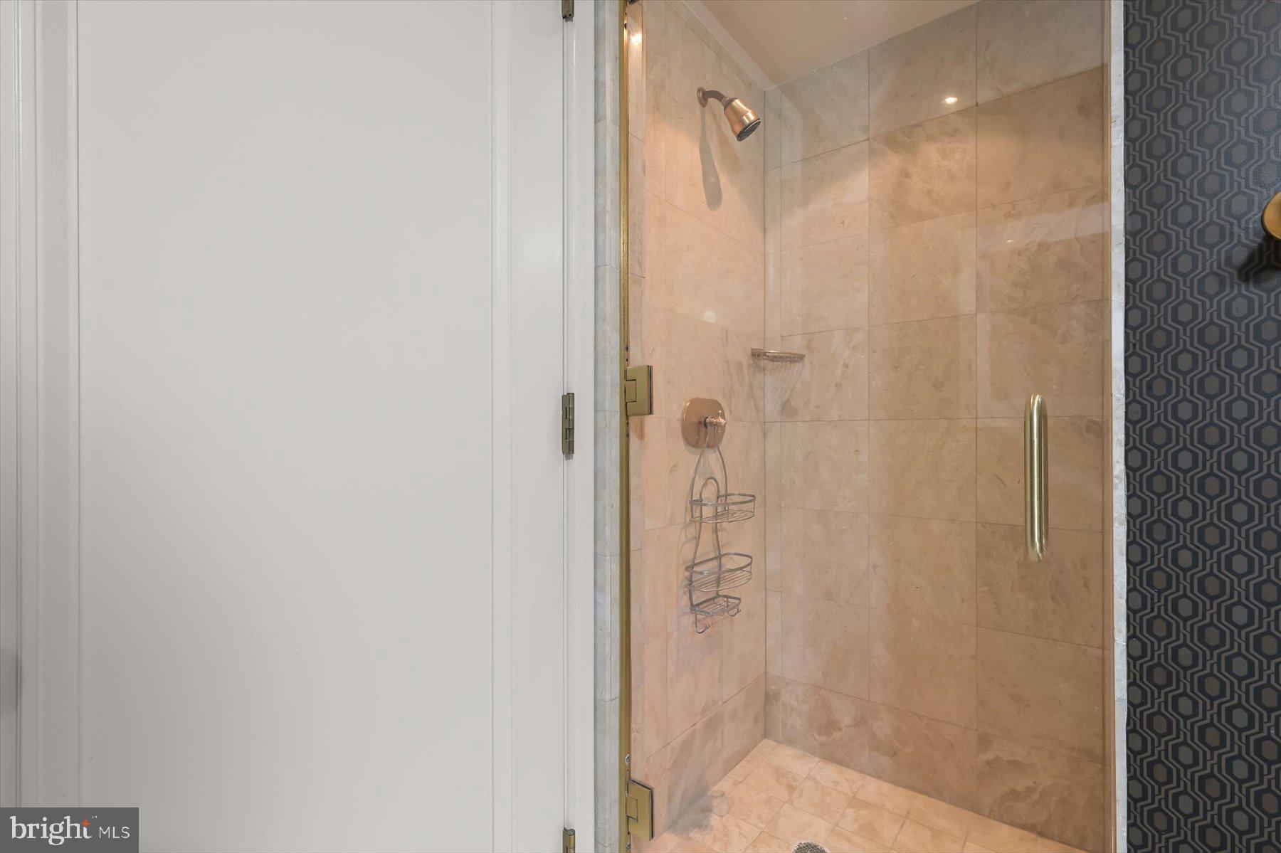 1155 23rd Street Northwest, Unit 6G Washington, DC 20037 - Photo 11 of 15 a bathroom with a shower