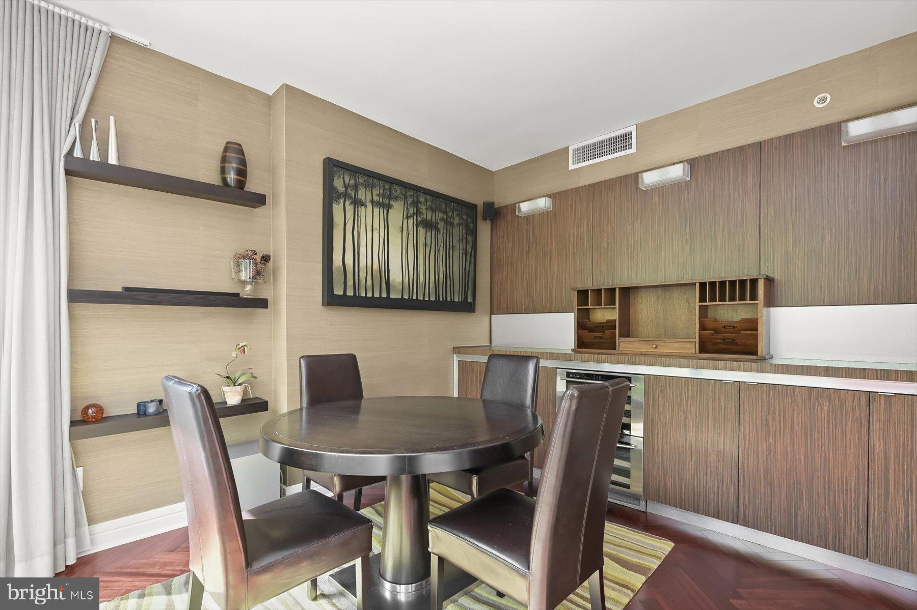1155 23rd Street Northwest, Unit 6G Washington, DC 20037 - Photo 7 of 15 a dining room with furniture and window
